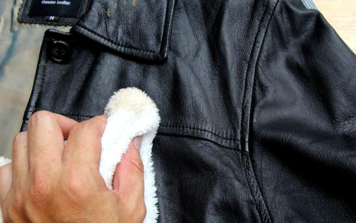 Applying Leather Cleaner On Jacket