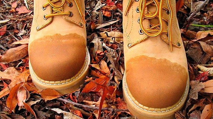 Leather Boots With Worn Off Layer Of Water Repellent
